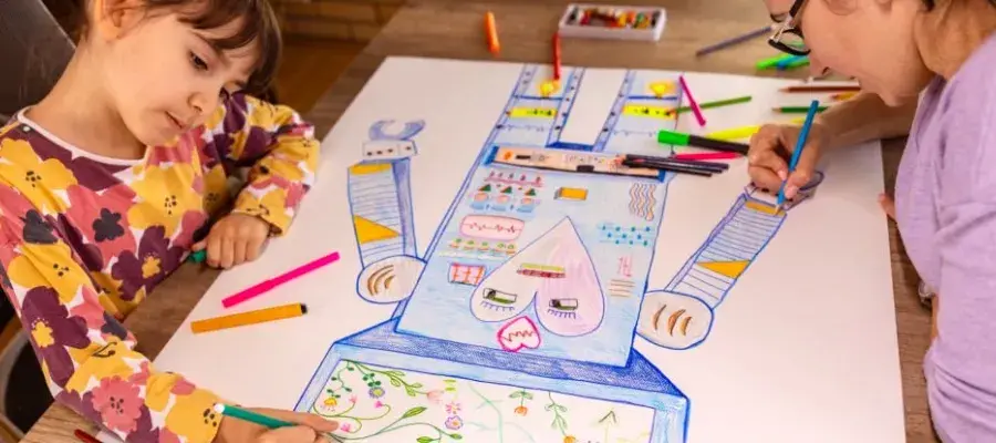And adult and child draw a colourful robot together.